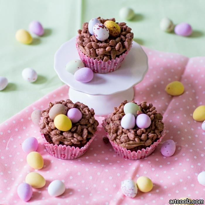 a pink blanket of muffins with yellow and green easter eggs easter muffins easter baking ideas