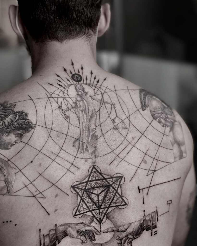 Sacred geometry tattoo trend example of a man back