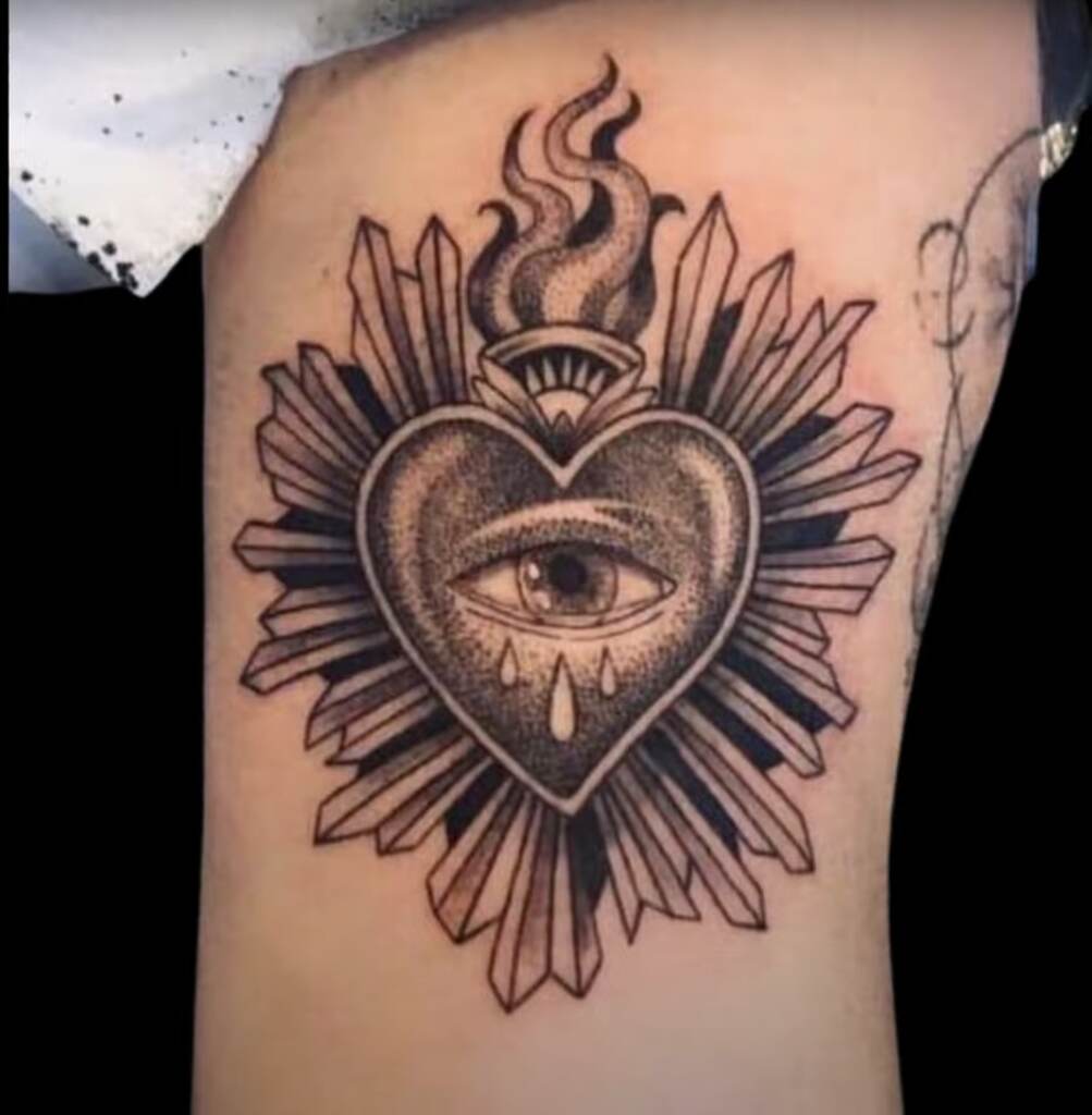 Sacred heart tattoo design example for womans chest