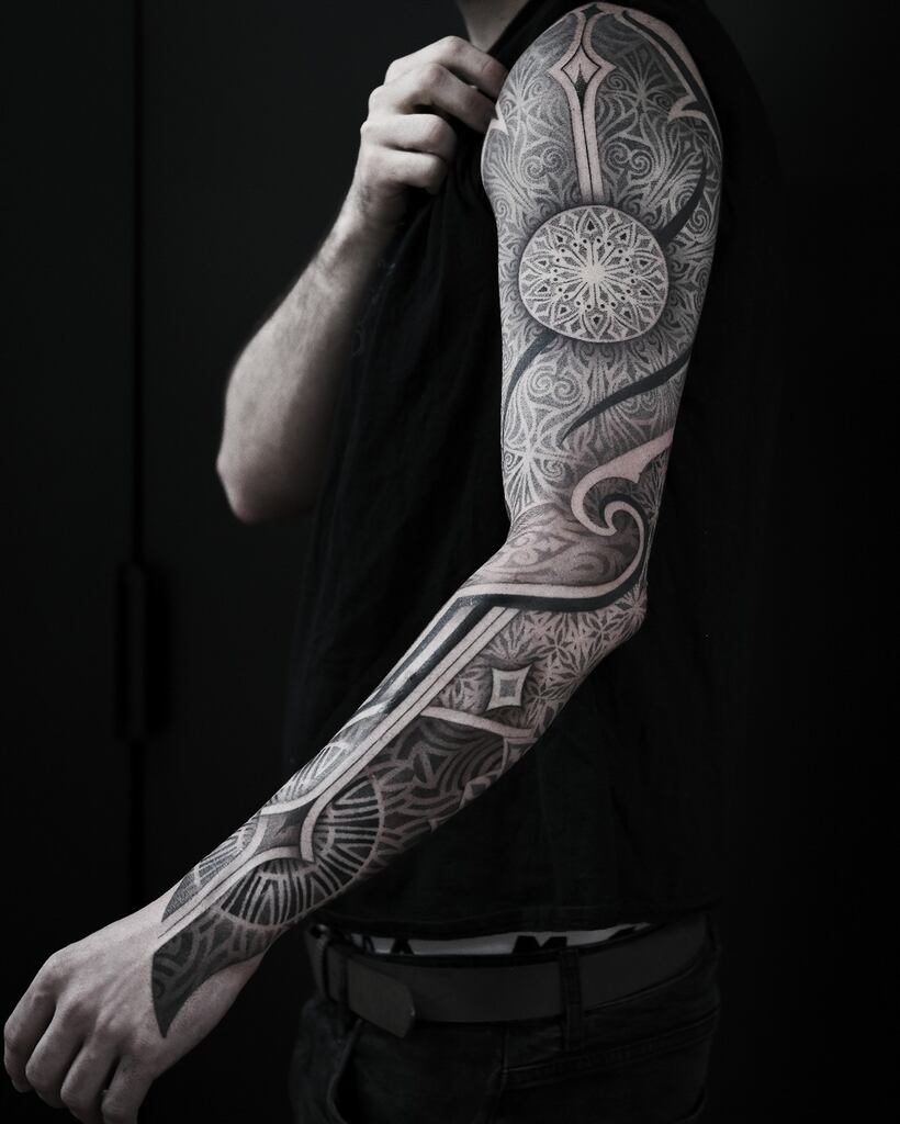 sacred tattoo design art, on arm, geometric heart tattoo